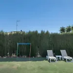 בית נופש Casa Con Piscina Compartida En